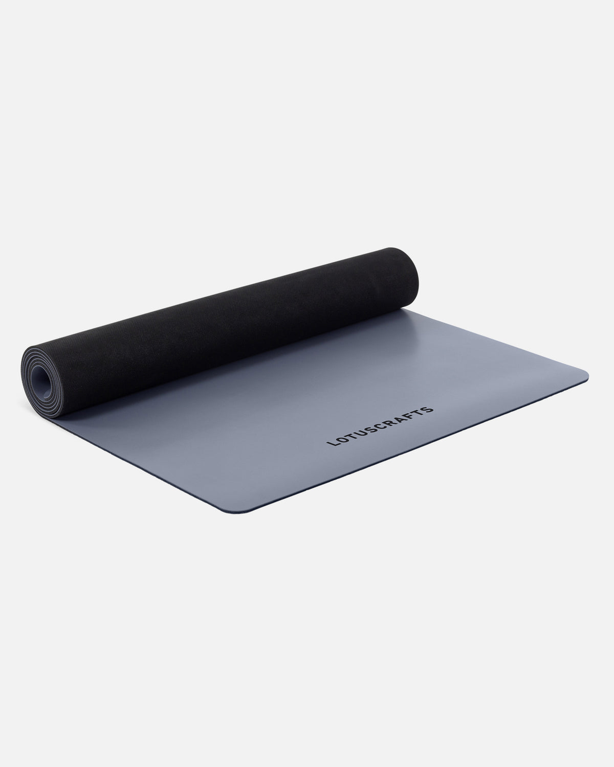 Indigo Dust - Yogamatte PURE halb aufgerollt, Ansicht schräg vorne | Lotuscrafts